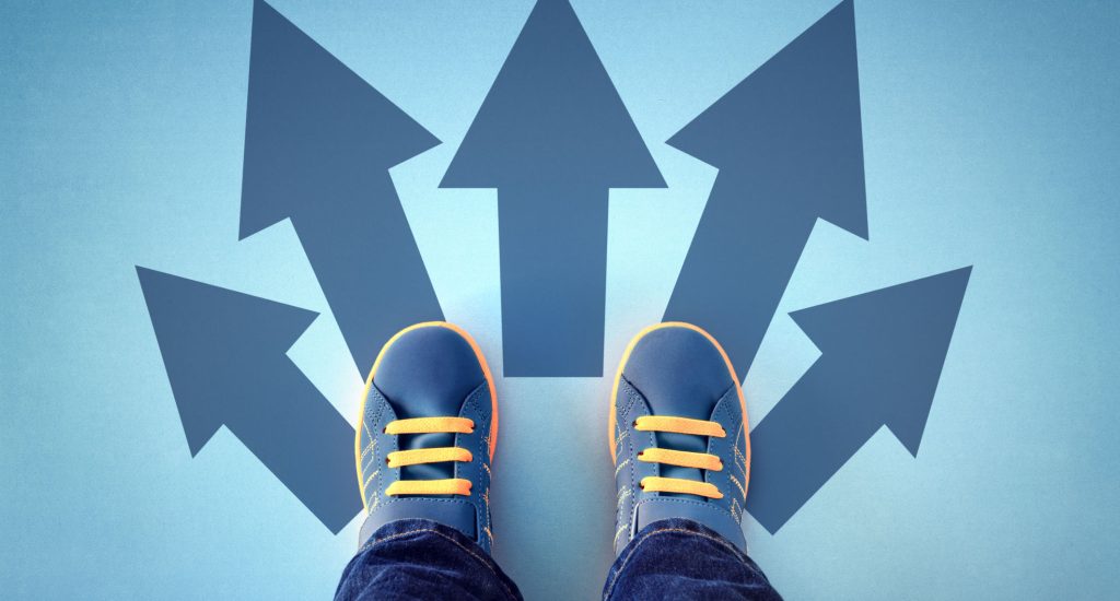 Taking decisions for the future child standing with many direction arrow choices, left, right or move forward